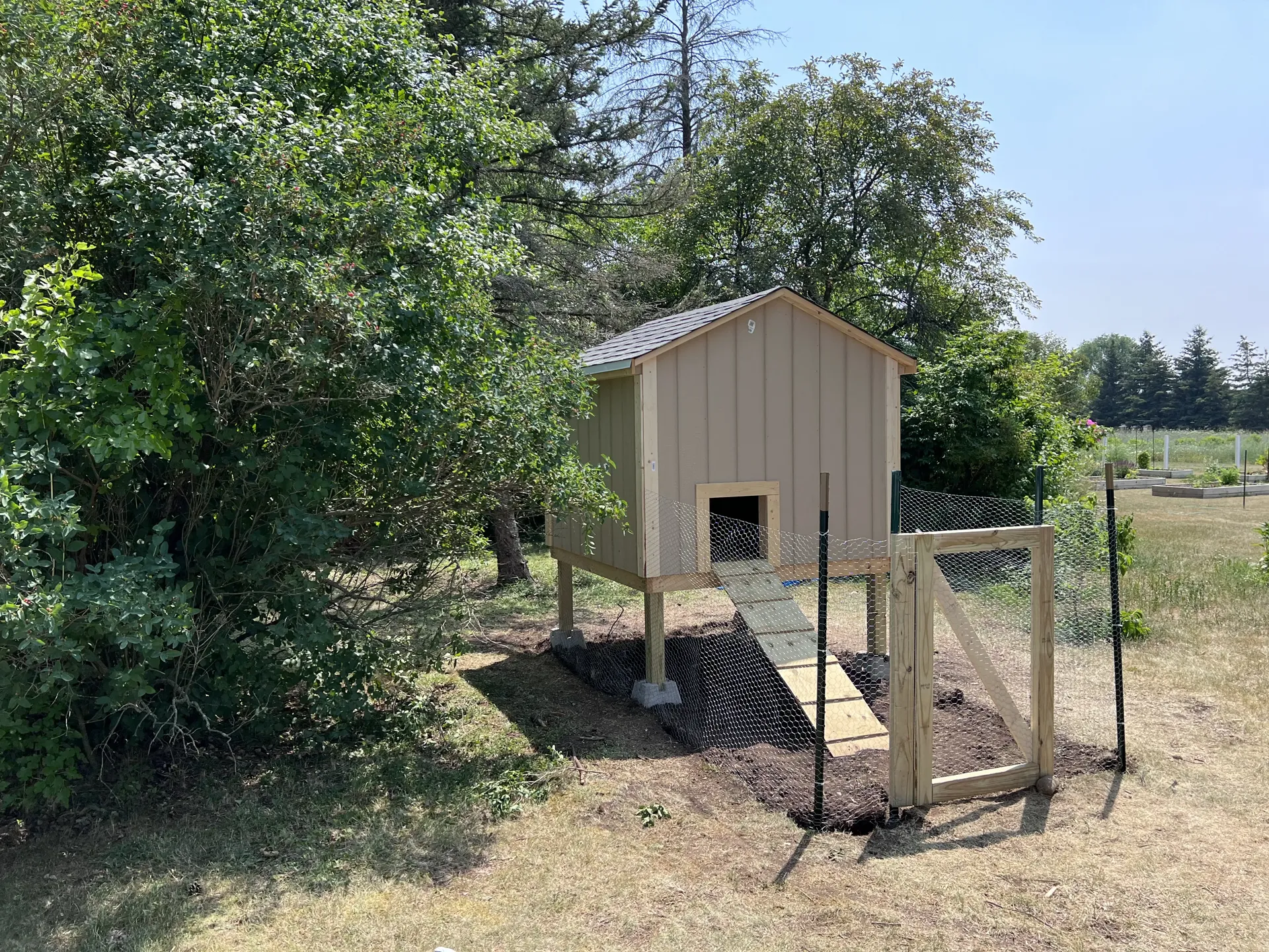 Front left view of exterior run and hen house entrance